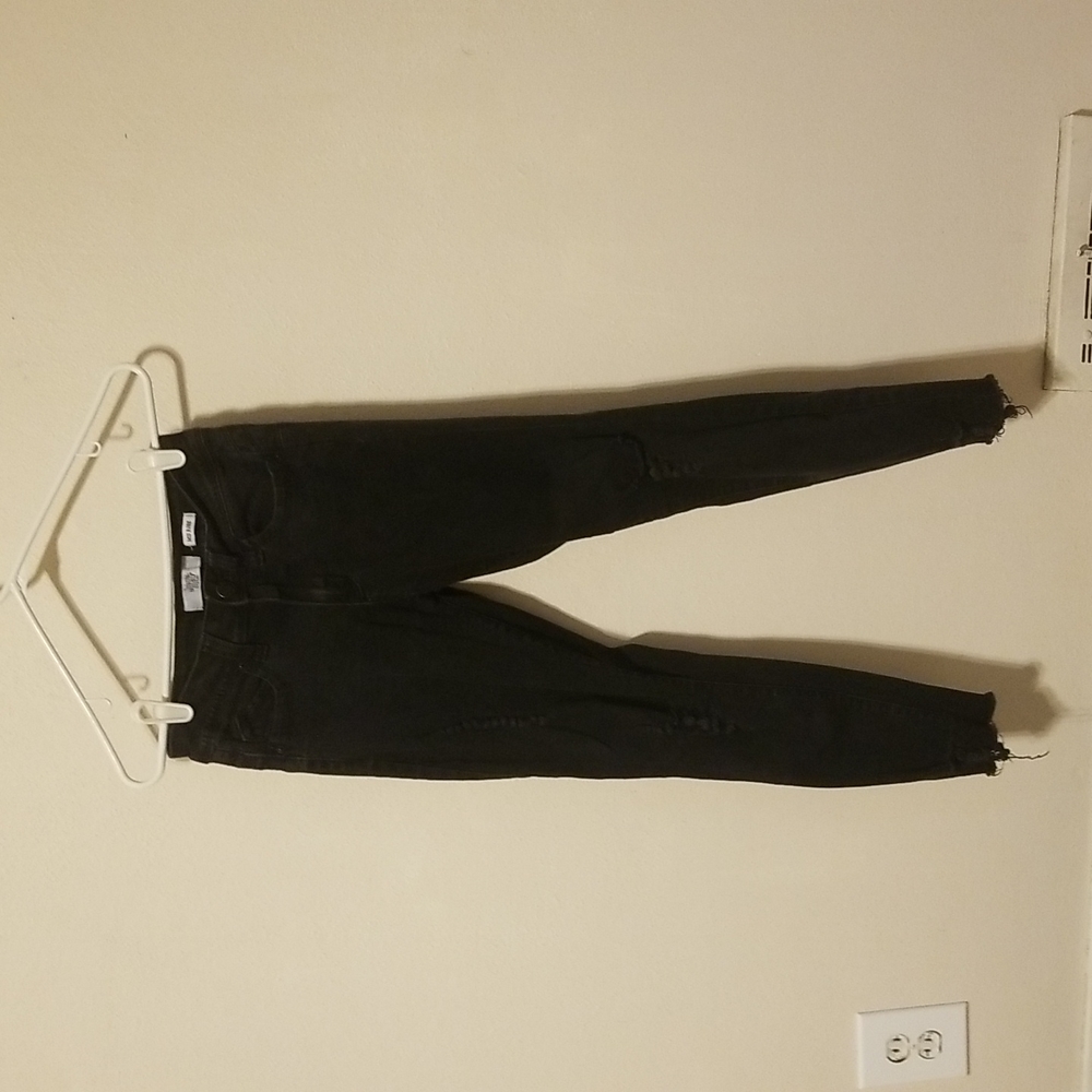 Ripped black skinny jeans